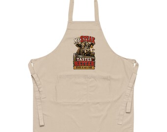 My Steak Tastes Better organic cotton apron with the full design visible
