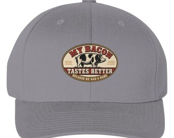 Grey My Bacon Tastes Better Flexfit cap with the centered oval patch visible